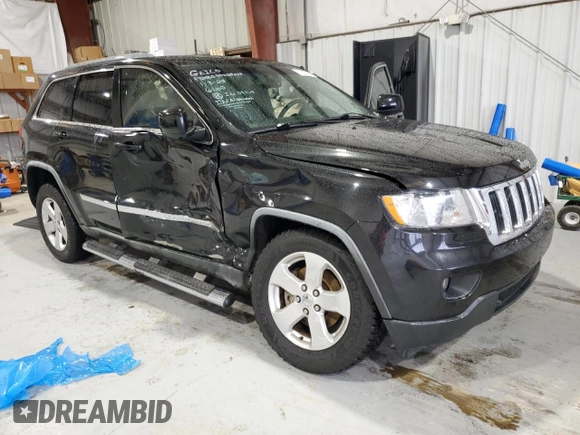 2012 Jeep Grand Cherokee Laredo with VIN 1C4RJEAG4CC146160, listed as a Copart auction lot 87515345 with 116,936 mi miles and Salvage Title. Bid and sale history available at carsss.com. Image 4.