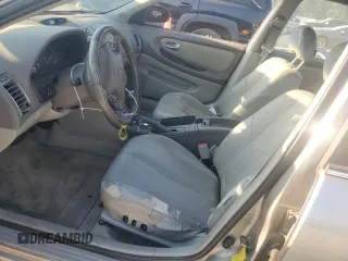 2001 Nissan Maxima GXE z VIN JN1CA31D11T828767, wystawiony jako Copart lot #69504024 z przebiegiem 177 431 mil mil oraz Szkoda całkowita • Salvage title. Historia ofert i sprzedaży dostępna na DreamBid. Obrazek 7.