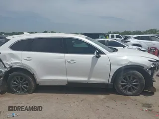 2021 Mazda CX-9 Touring with VIN JM3TCACY9M0526376, listed as a IAAI auction lot 42264478 with 74,671 mi miles and . Bid and sale history available at DreamBid. Image 13.