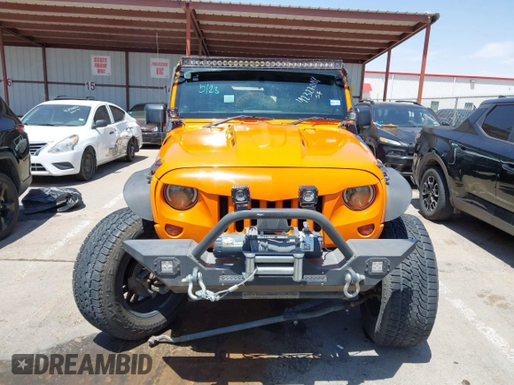 2012 Jeep Wrangler Unlimited Sport RHD with VIN 1C4BJWKGXCL221613, listed as a IAAI auction lot 42327004 with 129,375 mi miles and . Bid and sale history available at DreamBid. Image 12.