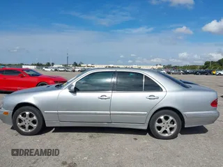 2002 Mercedes-Benz E-Class with VIN WDBJF82J02X070968, listed as a IAAI auction lot 41352216 with 91,704 mi miles. Bid and sale history available at carsss.com. Image 14.