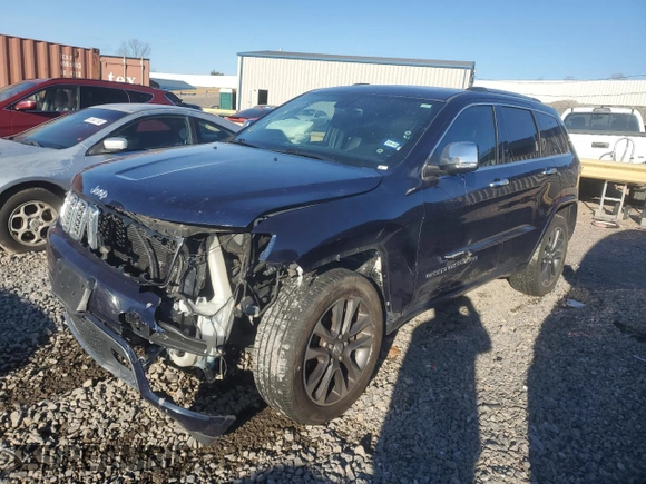 2017 Jeep Grand Cherokee Overland with VIN 1C4RJFCG1HC778818, listed as a Copart auction lot 87368764 with 62,471 mi miles and Salvage Title. Bid and sale history available at carsss.com. Image 1.