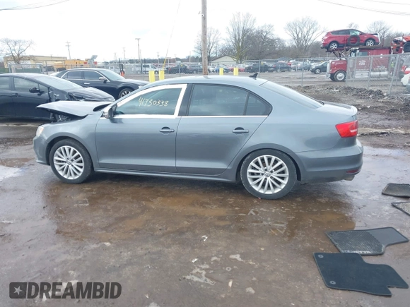 2015 Volkswagen Jetta Sedan 1.8T SE w/Connectivity with VIN 3VWD07AJ8FM260537, listed as a IAAI auction lot 41730338 with 155,724 mi miles. Bid and sale history available at carsss.com. Image 14.