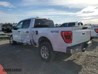 2021 Ford F-150 XL with VIN 1FTFW1E83MFB80686, listed as a Copart auction lot 52386125 with 156,582 mi miles and Salvage Title. Bid and sale history available at carsss.com. Image 2.