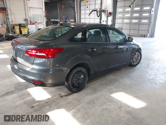 2017 Ford Focus SE with VIN 1FADP3F29HL220440, listed as a IAAI auction lot 41975013 with 40,295 mi miles and . Bid and sale history available at DreamBid. Image 4.