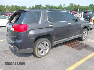 2013 GMC Terrain SLT z VIN 2GKFLWE31D6120642, wystawiony jako IAAI lot #42409573 z przebiegiem 148 224 mil mil oraz . Historia ofert i sprzedaży dostępna na DreamBid. Obrazek 4.