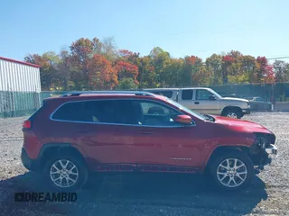 2016 Jeep Cherokee Latitude with VIN 1C4PJMCB2GW153972, listed as a IAAI auction lot 40579489 with 130,176 mi miles. Bid and sale history available at carsss.com. Image 13.