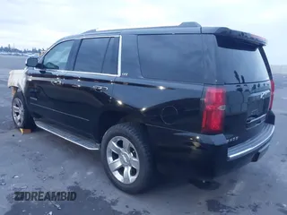 2015 Chevrolet Tahoe LTZ z VIN 1GNSKCKC5FR213209, wystawiony jako IAAI lot #41023368 z przebiegiem Nie podano mil oraz . Historia ofert i sprzedaży dostępna na DreamBid. Obrazek 3.