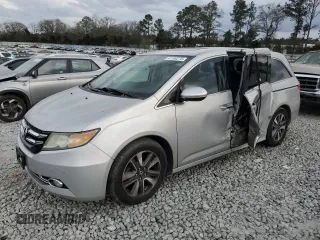 2014 Honda Odyssey Touring with VIN 5FNRL5H90EB096137, listed as a Copart auction lot 47192275 with 164,620 mi miles and Salvage Title. Bid and sale history available at DreamBid. Image 1.
