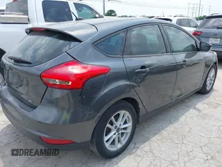 2017 Ford Focus SE with VIN 1FADP3K24HL318684, listed as a IAAI auction lot 42161586 with 196,681 mi miles and . Bid and sale history available at carsss.com. Image 4.