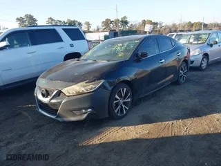 2016 Nissan Maxima 3.5 SL with VIN 1N4AA6AP3GC411553, listed as a IAAI auction lot 41679632 with 999,999 mi miles. Bid and sale history available at carsss.com. Image 16.