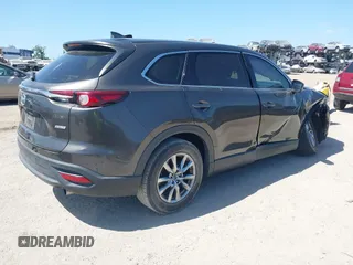 2019 Mazda CX-9 Touring with VIN JM3TCACY9K0304899, listed as a IAAI auction lot 42167180 with 57,043 mi miles and . Bid and sale history available at DreamBid. Image 4.