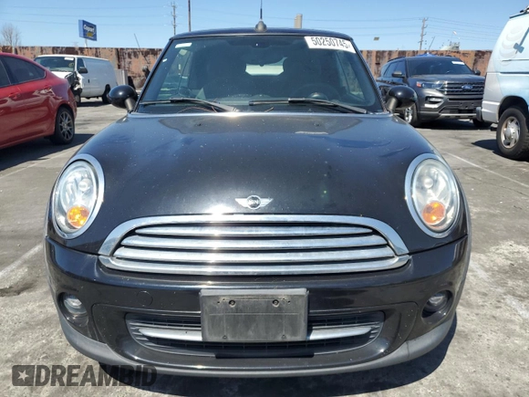 2015 MINI Convertible with VIN WMWZN3C56FT266838, listed as a Copart auction lot 50250745 with 60,331 mi miles and Salvage title. Bid and sale history available at DreamBid. Image 5.