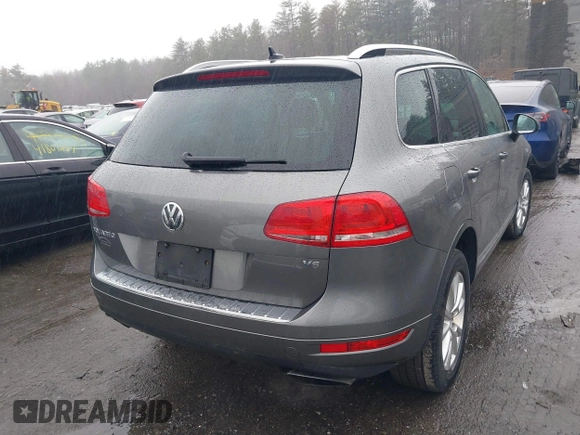 2013 Volkswagen Touareg Lux with VIN WVGEF9BP7DD007170, listed as a IAAI auction lot 41787075 with 131,089 mi miles and . Bid and sale history available at DreamBid. Image 17.