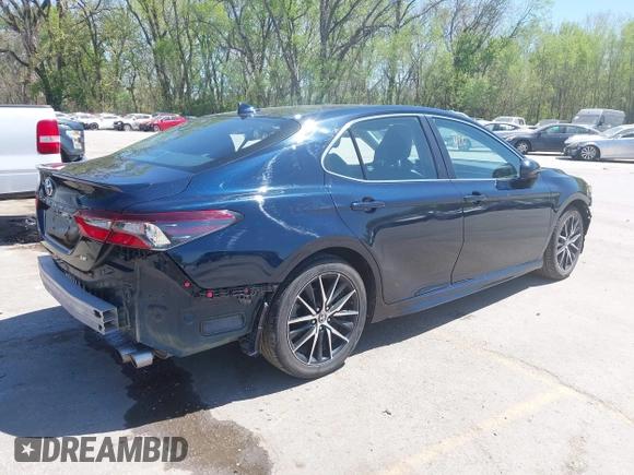 2021 Toyota Camry SE Nightshade with VIN 4T1G11AK3MU462290, listed as a IAAI auction lot 42033207 with 111,163 mi miles and . Bid and sale history available at DreamBid. Image 4.