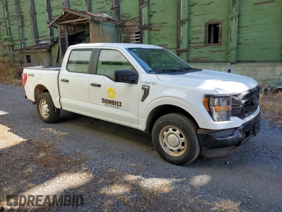 2023 Ford F-150 XL with VIN 1FTEW1EBXPKE80986, listed as a Copart auction lot 60357284 with 10,525 mi miles and Salvage Title. Bid and sale history available at carsss.com. Image 4.