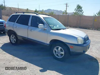 2003 Hyundai Santa Fe LX z VIN KM8SC73E63U538646, wystawiony jako IAAI lot #42510046 z przebiegiem 198 195 mil mil oraz . Historia ofert i sprzedaży dostępna na DreamBid. Obrazek 1.