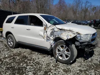 2012 Dodge Durango SXT with VIN 1C4RDJAG4CC111666, listed as a Copart auction lot 50459925 with 184,892 mi miles and Salvage title. Bid and sale history available at DreamBid. Image 4.