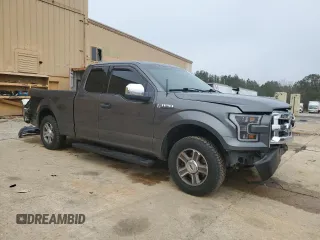 2015 Ford F-150 XL with VIN 1FTEX1C8XFFA48801, listed as a Copart auction lot 43728595 with 144,829 mi miles and Salvage Title. Bid and sale history available at carsss.com. Image 4.