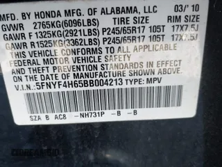 2011 Honda Pilot EX-L with VIN 5FNYF4H65BB004213, listed as a IAAI auction lot 41867681 with 157,644 mi miles and . Bid and sale history available at carsss.com. Image 9.
