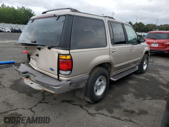 1997 Ford Explorer XLT with VIN 1FMDU35PXVZB69793, listed as a Copart auction lot 70712774 with 138,243 mi miles and Salvage title. Bid and sale history available at DreamBid. Image 3.