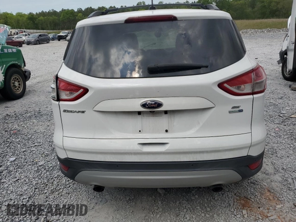 2014 Ford Escape SE z VIN 1FMCU9GX2EUC85787, wystawiony jako Copart lot #52739085 z przebiegiem 123 641 mil mil oraz Szkoda całkowita • Salvage title. Historia ofert i sprzedaży dostępna na DreamBid. Obrazek 6.