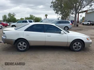 1997 Lexus ES 300 с VIN JT8BF22G2V0032810, выставлен на аукционе IAAI как лот 42130566 с пробегом 386 193 миль миль и . История ставок и продаж доступна на DreamBid. Изображение 13.