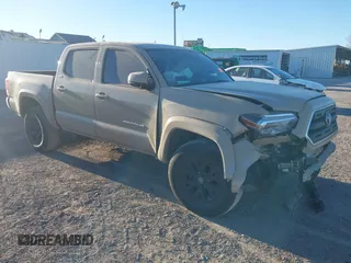 2017 Toyota Tacoma SR5 z VIN 5TFAZ5CN2HX039996, wystawiony jako IAAI lot #41406419 z przebiegiem 132 200 mil mil oraz . Historia ofert i sprzedaży dostępna na DreamBid. Obrazek 1.