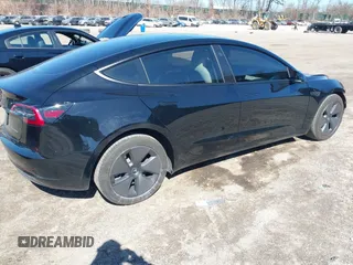 2023 Tesla Model 3 Long Range with VIN 5YJ3E1EB1PF632595, listed as a IAAI auction lot 41754131 with 8,147 mi miles and . Bid and sale history available at DreamBid. Image 4.