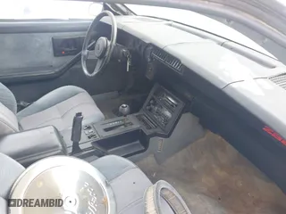1985 Chevrolet Camaro Z28 Sport with VIN 1G1FP87HXFL442512, listed as a IAAI auction lot 41387610 with 136,000 mi miles. Bid and sale history available at carsss.com. Image 5.
