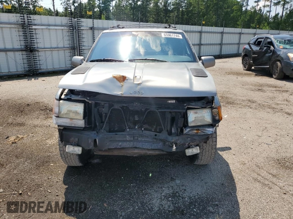 1998 Jeep Grand Cherokee Limited with VIN 1J4GZ88Z9WC148445, listed as a Copart auction lot 65961744 with 180,067 mi miles and Clean Title. Bid and sale history available at carsss.com. Image 5.
