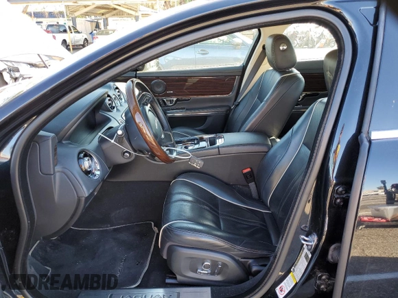 2018 Jaguar XJ with VIN SAJWA1C79J8W14555, listed as a Copart auction lot 39950303 with 86,316 mi miles. Bid and sale history available at carsss.com. Image 7.