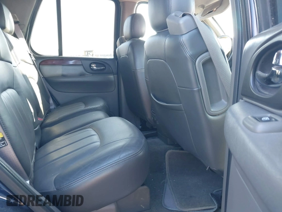2003 GMC Envoy SLT with VIN 1GKDT13S732268164, listed as a IAAI auction lot 41863800 with 100,702 mi miles. Bid and sale history available at carsss.com. Image 8.