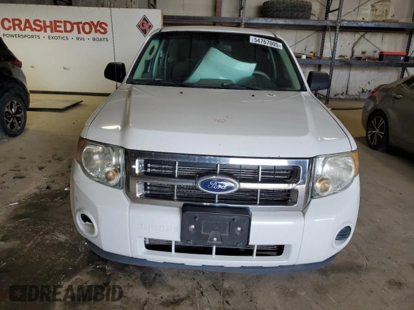 2011 Ford Escape XLS с VIN 1FMCU0C78BKC53371, выставлен на аукционе Copart как лот 54767005 с пробегом 227 192 миль миль и Списание • Salvage title. История ставок и продаж доступна на DreamBid. Изображение 5.