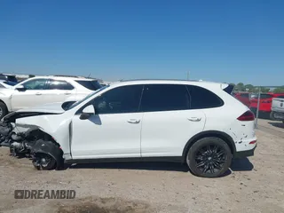 2016 Porsche Cayenne with VIN WP1AA2A29GLA04374, listed as a IAAI auction lot 41988374 with 144,716 mi miles. Bid and sale history available at carsss.com. Image 14.
