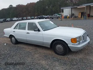 1989 Mercedes-Benz 420 Series 420SEL with VIN WDBCA35E4KA456613, listed as a IAAI auction lot 41145650 with 199,599 mi miles. Bid and sale history available at carsss.com. Image 13.