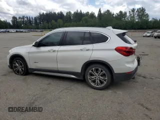 2016 BMW X1 xDrive28i z VIN WBXHT3C30G5E54396, wystawiony jako Copart lot #56042815 z przebiegiem 101 632 mil mil oraz Szkoda całkowita • Salvage title. Historia ofert i sprzedaży dostępna na DreamBid. Obrazek 2.