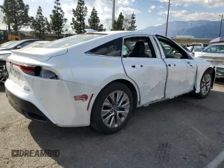 2023 Toyota Mirai XLE with VIN JTDAAAAA4PA009853, listed as a Copart auction lot 51687695 with 27,638 mi miles and Salvage Title. Bid and sale history available at DreamBid. Image 3.