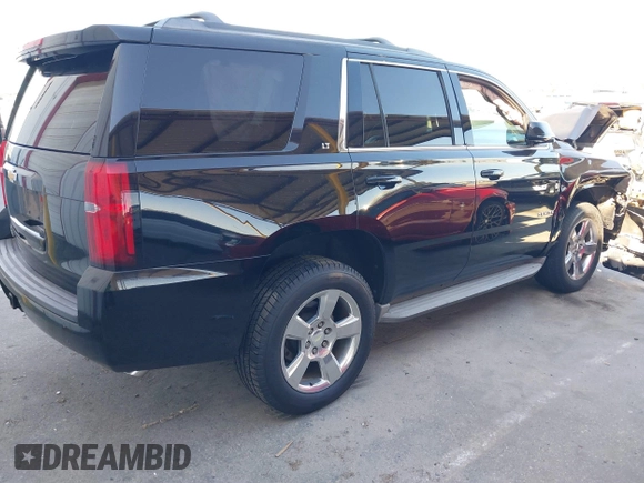 2015 Chevrolet Tahoe LT with VIN 1GNSCBKC6FR188764, listed as a IAAI auction lot 40267671 with 86,663 mi miles and . Bid and sale history available at DreamBid. Image 4.