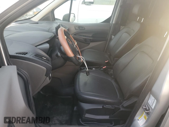 2021 Ford Transit Connect XL z VIN NM0LS6E22M1498123, wystawiony jako Copart lot #74475814 z przebiegiem Nie podano mil oraz Szkoda całkowita • Salvage title. Historia ofert i sprzedaży dostępna na DreamBid. Obrazek 7.