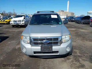 2008 Ford Escape XLT with VIN 1FMCU031X8KE76869, listed as a IAAI auction lot 41802935 with 155,746 mi miles. Bid and sale history available at carsss.com. Image 12.