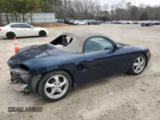 2000 Porsche Boxster z VIN WP0CA2987YU623473, wystawiony jako Copart lot #46845945 z przebiegiem 72 104 mil mil oraz Szkoda całkowita • Salvage title. Historia ofert i sprzedaży dostępna na DreamBid. Obrazek 3.
