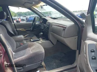 2000 Jeep Grand Cherokee Laredo z VIN 1J4GW48S2YC288439, wystawiony jako IAAI lot #42492798 z przebiegiem 272 527 mil mil oraz . Historia ofert i sprzedaży dostępna na DreamBid. Obrazek 5.