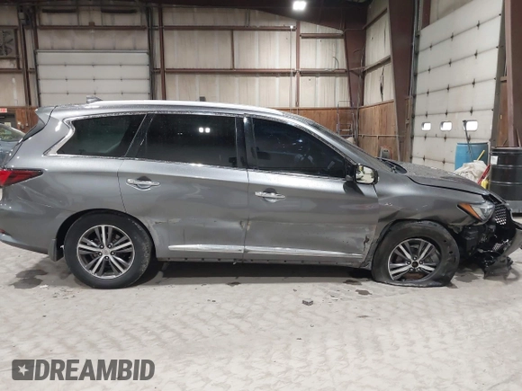 2017 Infiniti QX60 with VIN 5N1DL0MM1HC528514, listed as a IAAI auction lot 41986931 with 90,033 mi miles and . Bid and sale history available at DreamBid. Image 6.