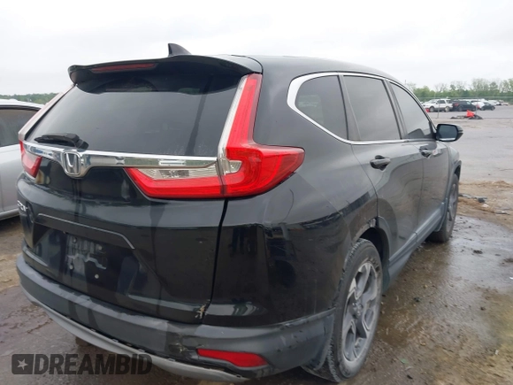 2017 Honda CR-V EX with VIN 7FARW1H59HE007171, listed as a IAAI auction lot 42033941 with 134,227 mi miles and . Bid and sale history available at DreamBid. Image 4.