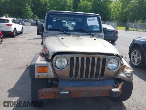 2005 Jeep Wrangler Sport with VIN 1J4FA49SX5P317120, listed as a IAAI auction lot 42677397 with 71,403 mi miles and . Bid and sale history available at DreamBid. Image 12.