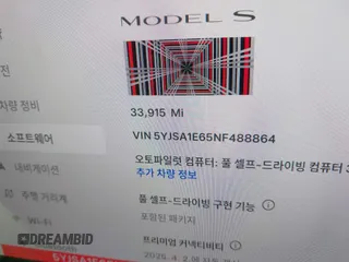 2022 Tesla Model S Plaid with VIN 5YJSA1E65NF488864, listed as a IAAI auction lot 41772788 with 33,915 mi miles and . Bid and sale history available at DreamBid. Image 7.