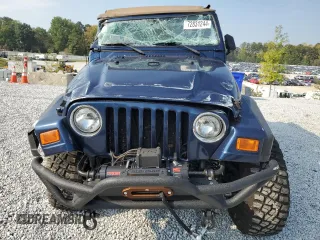 2001 Jeep Wrangler Sport with VIN 1J4FA49S41P335459, listed as a Copart auction lot 72831244 with 161,464 mi miles and Salvage Title. Bid and sale history available at carsss.com. Image 5.