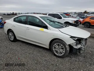 2017 Subaru Impreza Premium with VIN 4S3GKAB64H3621851, listed as a Copart auction lot 51896665 with 146,305 mi miles and Salvage title. Bid and sale history available at DreamBid. Image 4.