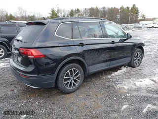 2019 Volkswagen Tiguan SE with VIN 3VV3B7AX2KM196407, listed as a IAAI auction lot 40993730 with 86,904 mi miles. Bid and sale history available at carsss.com. Image 4.
